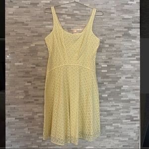 Yellow eyelet knee-length dress
